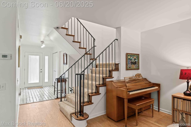 1360 Bramblebush Run, Bloomfield Hills, MI 48304 - stairs featuring wood finished floors
