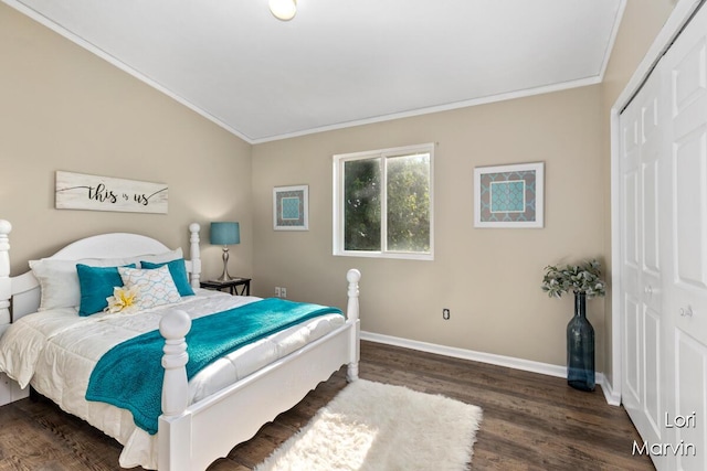 704 Pecan Ct NW, Grand Rapids, MI 49504 - bedroom featuring ornamental molding, wood finished floors, and a closet