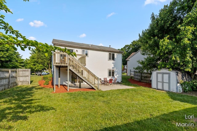 704 Pecan Ct NW, Grand Rapids, MI 49504 - back of property with a patio area, stairway, a shed, and a deck