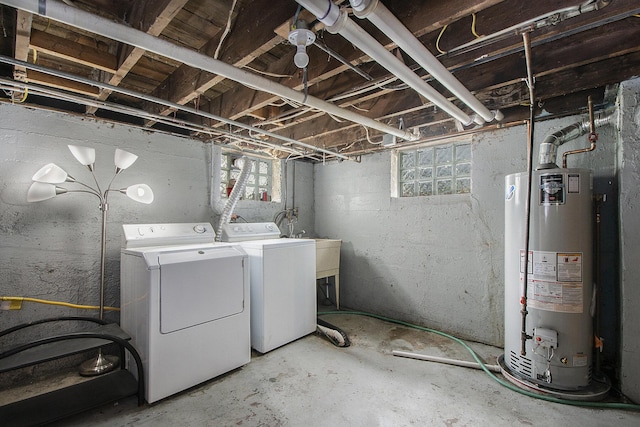 258 Richards Ave SW, Grand Rapids, MI 49504 - basement featuring water heater, independent washer and dryer, and plenty of natural light
