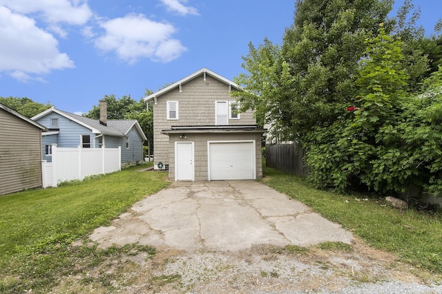 258 Richards Ave SW, Grand Rapids, MI 49504 - back of property featuring driveway and a garage