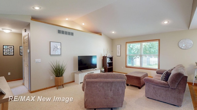 3137 Sundown Ln, Saginaw, MI 48603 - living room with vaulted ceiling, recessed lighting, and light colored carpet