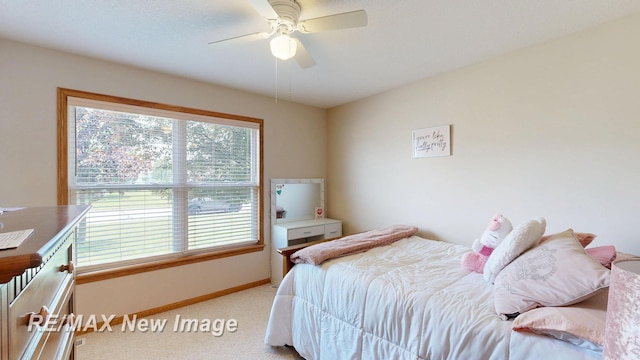 3137 Sundown Ln, Saginaw, MI 48603 - bedroom featuring light carpet and ceiling fan