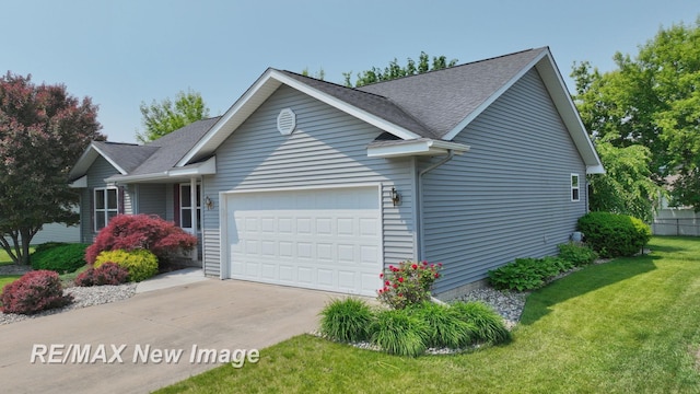 3137 Sundown Ln, Saginaw, MI 48603 - view of front of house with a garage, concrete driveway, and a shingled roof