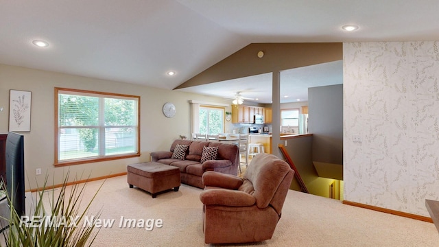 3137 Sundown Ln, Saginaw, MI 48603 - living area featuring light colored carpet, recessed lighting, lofted ceiling, and wallpapered walls