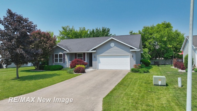 3137 Sundown Ln, Saginaw, MI 48603 - ranch-style home with an attached garage, concrete driveway, and a shingled roof