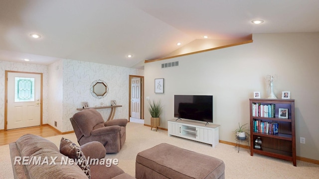 3137 Sundown Ln, Saginaw, MI 48603 - living room featuring vaulted ceiling, recessed lighting, and wallpapered walls
