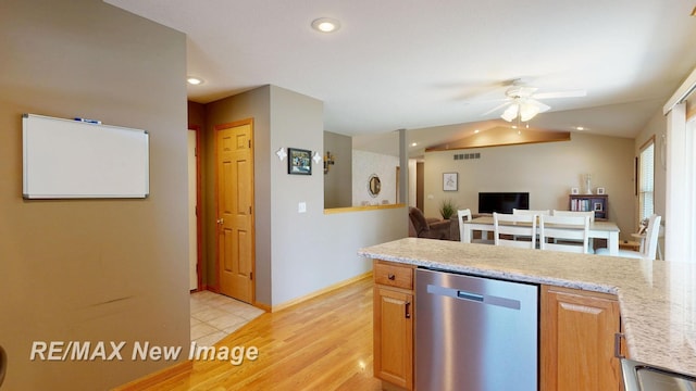 3137 Sundown Ln, Saginaw, MI 48603 - kitchen featuring stainless steel dishwasher, a ceiling fan, light wood-style flooring, recessed lighting, and open floor plan