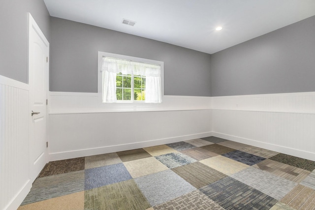14110 168th Ave, Grand Haven, MI 49417 - unfurnished room with a wainscoted wall