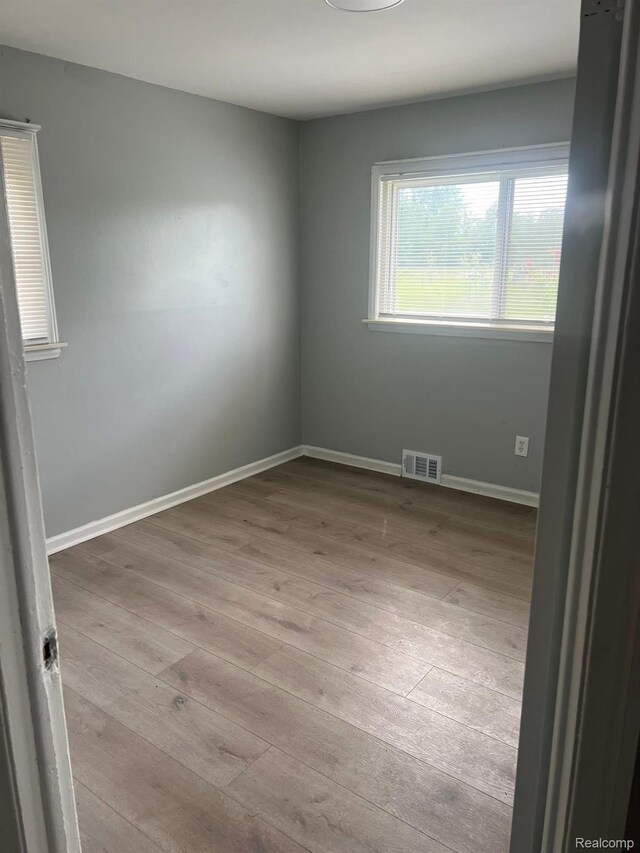 1435 Jeffrey Ln, Inkster, MI 48141 - spare room with wood-type flooring