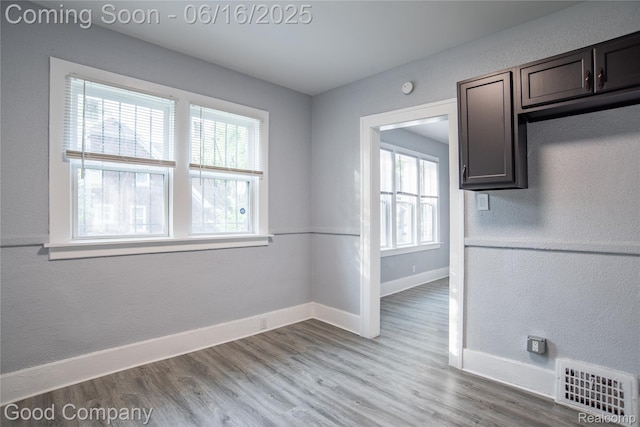5217 Lakeview St, Detroit, MI 48213 - unfurnished room featuring light wood-style floors and a textured wall