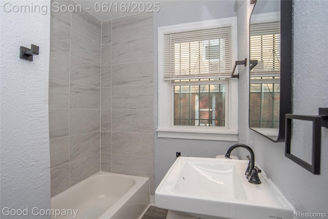 5217 Lakeview St, Detroit, MI 48213 - bathroom with a textured wall and tub / shower combination