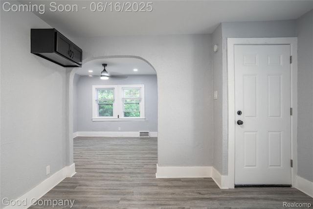 5217 Lakeview St, Detroit, MI 48213 - hallway with wood finished floors and arched walkways