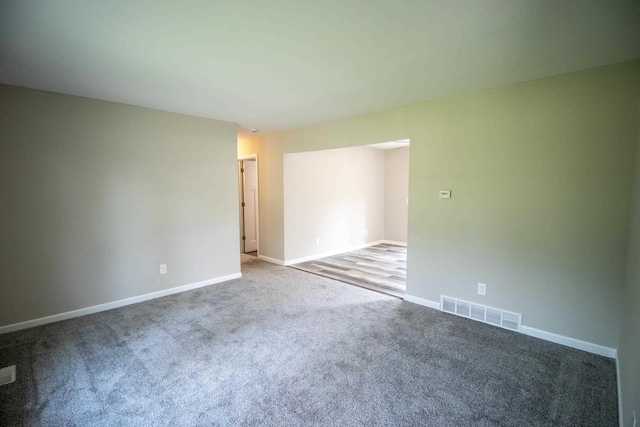 9461 Morrish Rd, Montrose, MI 48457 - empty room featuring carpet flooring and baseboards