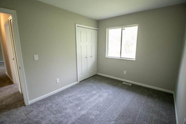 9461 Morrish Rd, Montrose, MI 48457 - unfurnished bedroom featuring carpet floors and a closet