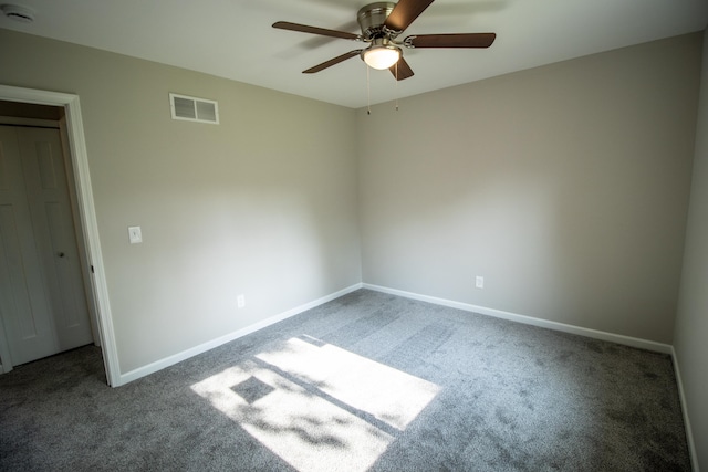 9461 Morrish Rd, Montrose, MI 48457 - unfurnished room featuring a smoke detector, carpet flooring, and ceiling fan