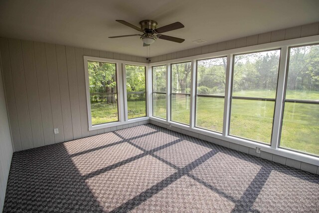 9461 Morrish Rd, Montrose, MI 48457 - unfurnished sunroom featuring a ceiling fan and healthy amount of natural light
