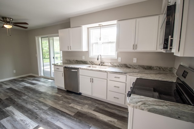 9461 Morrish Rd, Montrose, MI 48457 - kitchen with stainless steel appliances, a ceiling fan, white cabinets, and dark wood-type flooring