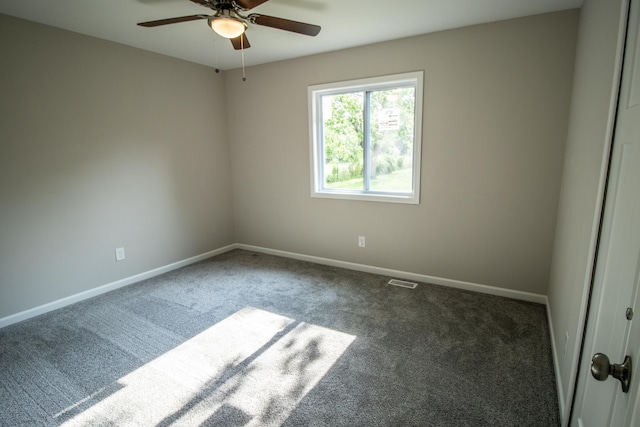 9461 Morrish Rd, Montrose, MI 48457 - spare room featuring carpet flooring and a ceiling fan