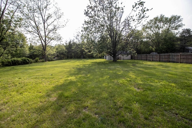 9461 Morrish Rd, Montrose, MI 48457 - view of yard featuring a storage unit