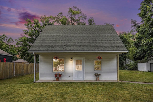 5747 Utah Ave, Portage, MI 49024 - view of front of home with roof with shingles and a storage shed