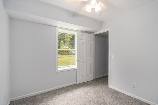 5747 Utah Ave, Portage, MI 49024 - unfurnished bedroom with carpet and ceiling fan