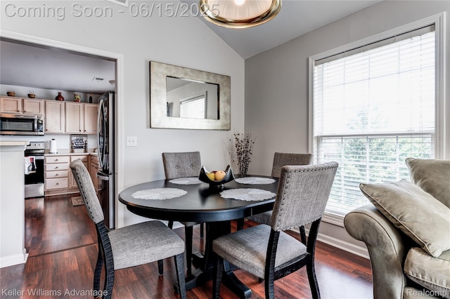 28498 Carlton Way Dr, Novi, MI 48377 - dining area with dark wood-type flooring and lofted ceiling