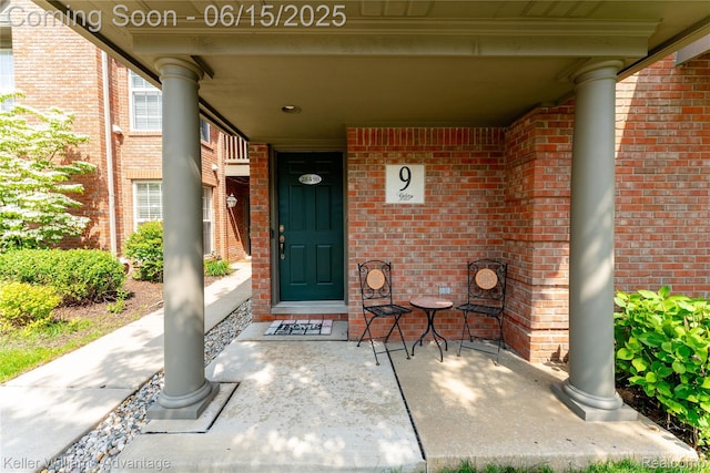 28498 Carlton Way Dr, Novi, MI 48377 - doorway to property with brick siding and a porch