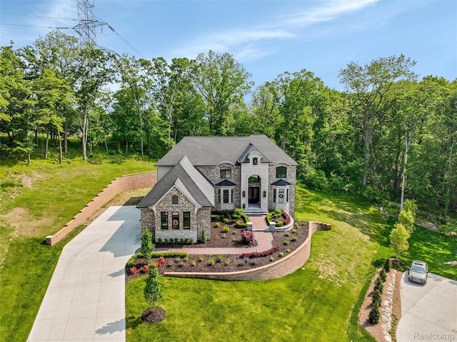 2584 Heights View Ct, Rochester, MI 48306 - french country home featuring stone siding, driveway, and a front yard