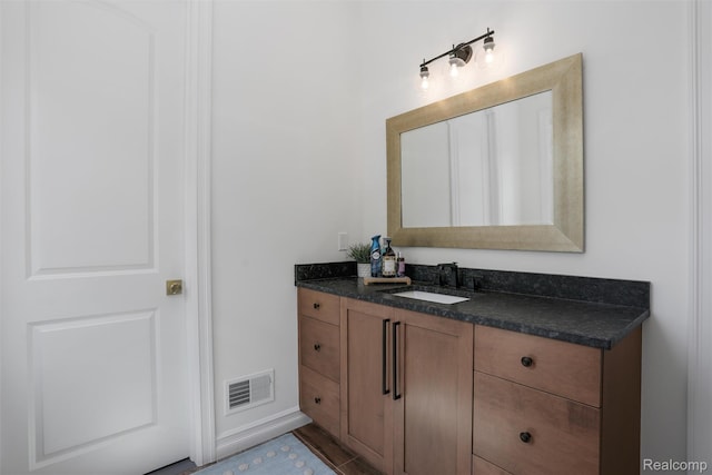 2584 Heights View Ct, Rochester, MI 48306 - bathroom with vanity and baseboards