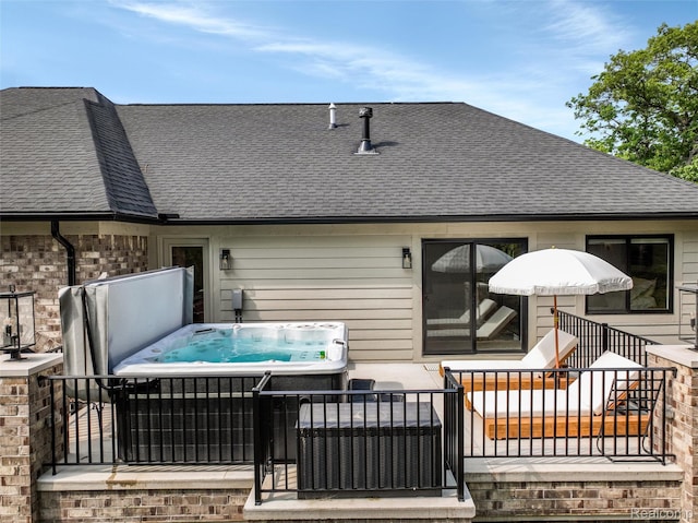 2584 Heights View Ct, Rochester, MI 48306 - back of house with a hot tub and roof with shingles
