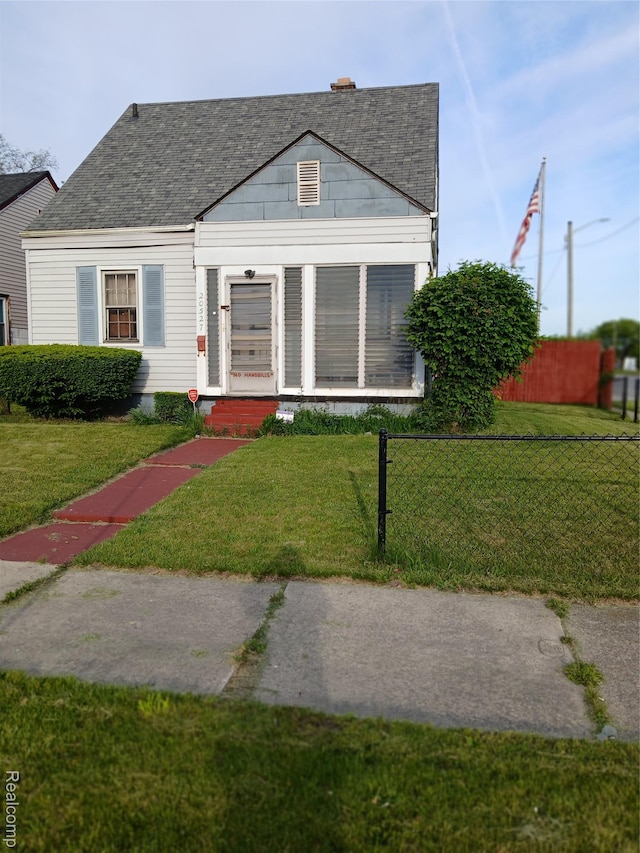 20527 Greeley St, Highland Park, MI 48203 - view of front facade with a shingled roof