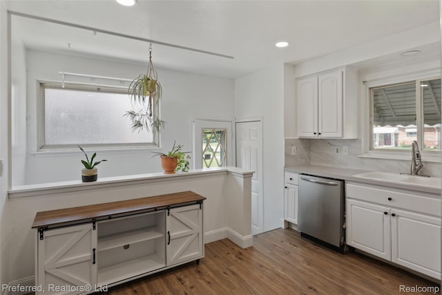 1330 Rahn St, Westland, MI 48186 - kitchen with dishwasher, white cabinetry, dark wood-type flooring, backsplash, and wood counters