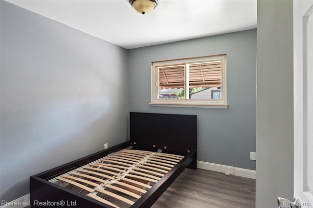 1330 Rahn St, Westland, MI 48186 - bedroom featuring wood finished floors and baseboards