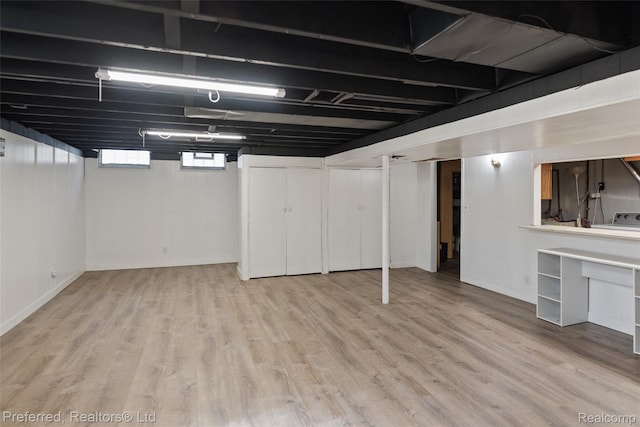 1330 Rahn St, Westland, MI 48186 - basement with wood finished floors and washer / clothes dryer