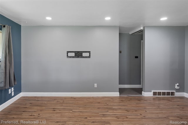 1330 Rahn St, Westland, MI 48186 - spare room featuring wood finished floors and recessed lighting