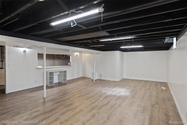 1330 Rahn St, Westland, MI 48186 - finished basement featuring wood finished floors