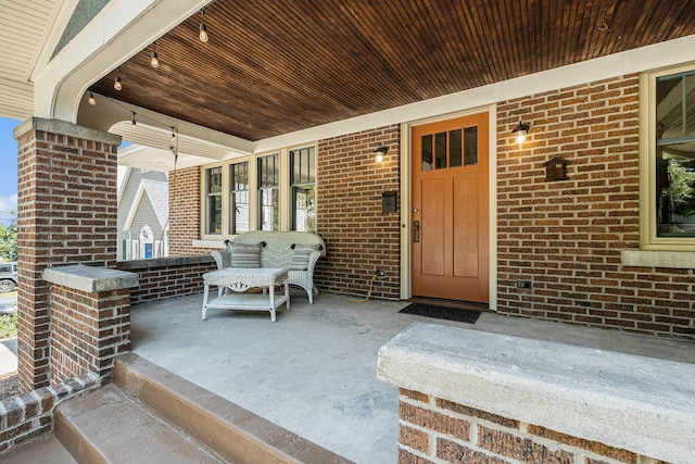 1412 4th St NW, Grand Rapids, MI 49504 - entrance to property featuring covered porch and brick siding