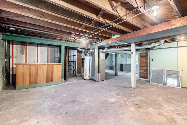 1412 4th St NW, Grand Rapids, MI 49504 - unfinished below grade area featuring gas water heater and heating unit