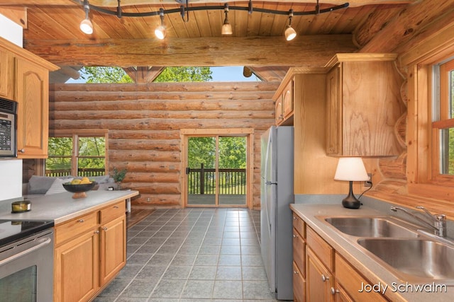 5820 Grace Hwy, Sunfield, MI 48890 - kitchen featuring rustic walls, freestanding refrigerator, a wooden ceiling with exposed beams, healthy amount of natural light, and stainless steel range with electric cooktop