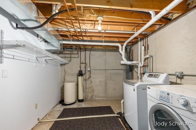 5820 Grace Hwy, Sunfield, MI 48890 - unfinished basement featuring washing machine and clothes dryer and a water softener system