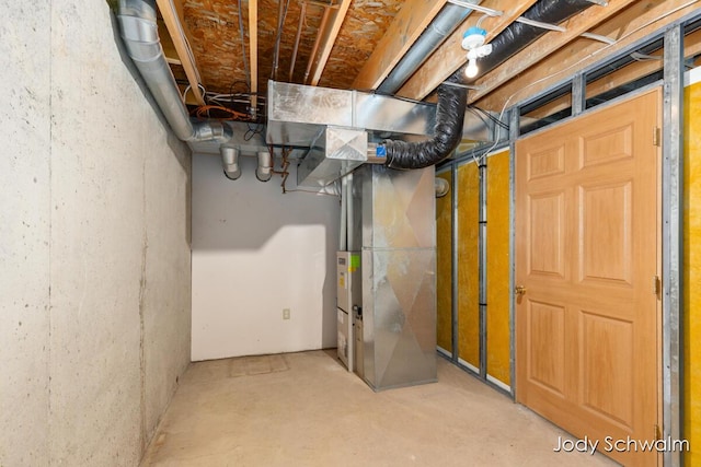 5820 Grace Hwy, Sunfield, MI 48890 - unfinished below grade area featuring heating unit