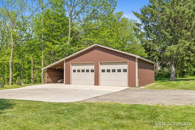 5820 Grace Hwy, Sunfield, MI 48890 - garage featuring a detached garage and driveway