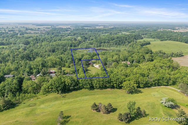 5820 Grace Hwy, Sunfield, MI 48890 - aerial view of property and surrounding area with property parcel outlined and a local golf course