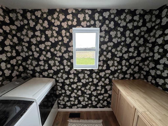 1131 Odell Farm Ln, Vicksburg, MI 49097 - miscellaneous room featuring wallpapered walls, independent washer and dryer, and wood finished floors