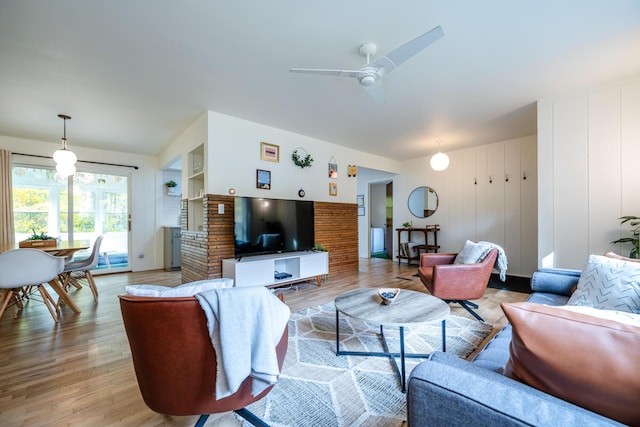 212 N Maple St, Saugatuck, MI 49453 - living room with light wood-style floors and ceiling fan