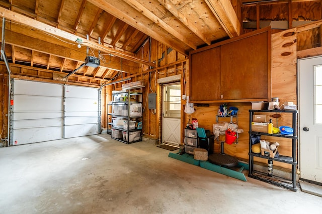 212 N Maple St, Saugatuck, MI 49453 - garage featuring a garage door opener