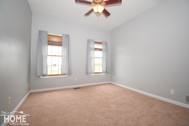 2411 Escott Rd, Owosso, MI 48867 - carpeted empty room featuring a ceiling fan and baseboards