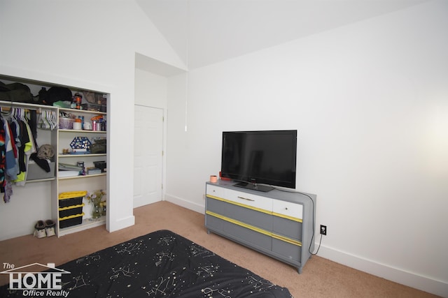 2411 Escott Rd, Owosso, MI 48867 - bedroom featuring carpet flooring, lofted ceiling, and a closet