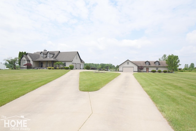 2411 Escott Rd, Owosso, MI 48867 - cape cod-style house with a front lawn